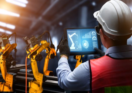 Smart industry robot arms for digital factory production technology showing automation manufacturing process of the Industry 4.0 or 4th industrial revolution and IOT software to control operation .